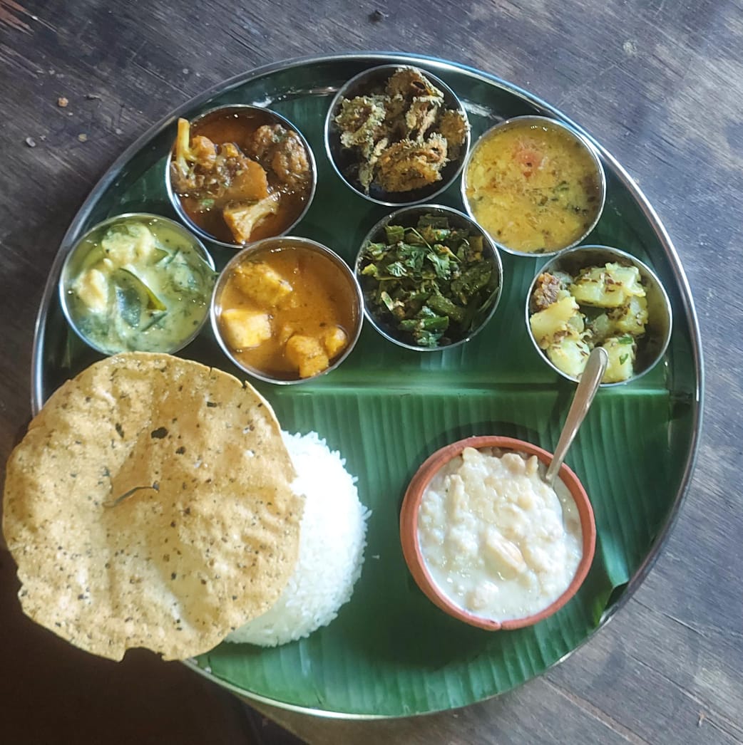 Traditional Odia thali served at Waldenwoods Eco Retreat in Tangi
